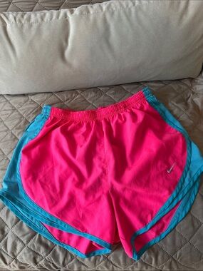 Nike Women’s Hot Pink Athletic Shorts with Teal Trim. Great condition.